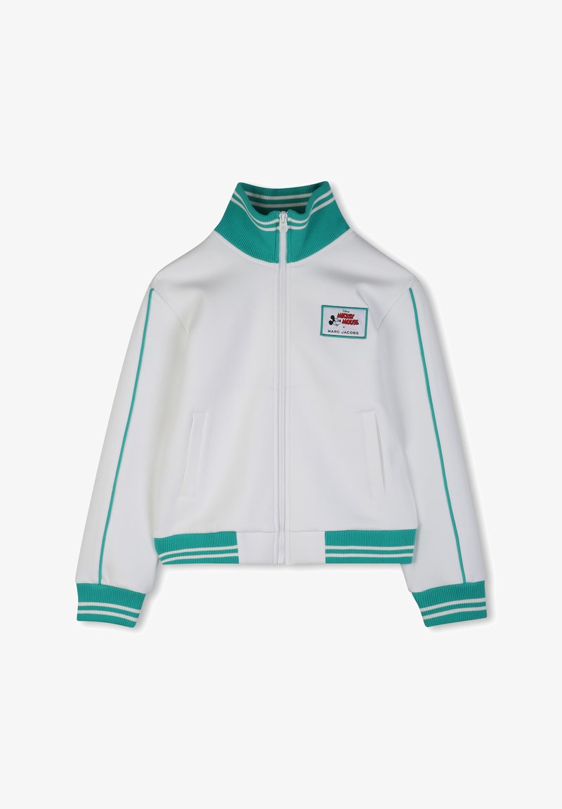Λευκό μπουφάν με φερμουάρ και τυρκουάζ λεπτομέρειες, με ριμπ γιακά, μανσέτες και τελείωμα. Διαθέτει πλαϊνές τσέπες και λογότυπο στο στήθος.