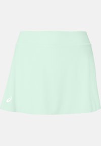 Light mint green athletic skirt with a smooth texture, flared shape, and a wide waistband, featuring a white logo on the lower left side.