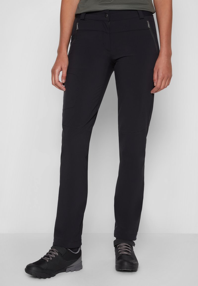 Black hiking pants made of lightweight fabric, featuring a slim fit, zippered pockets, and articulated knees for mobility. Paired with black footwear.