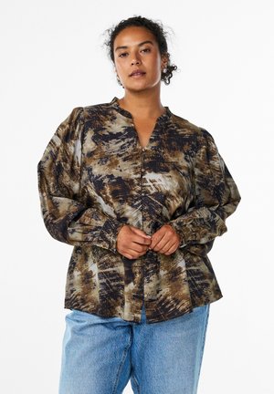 Brown and navy patterned long-sleeve blouse with a collar and front buttons, featuring gathered shoulders and a loose fit.