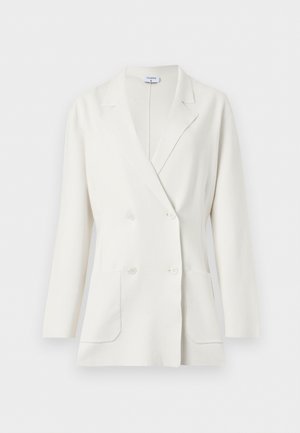 Λευκό διπλομπουκωτό σακάκι με πέτο notch, μακριά μανίκια, δύο μπροστινές τσέπες και τέσσερα λευκά κουμπιά από τη Filippa K.