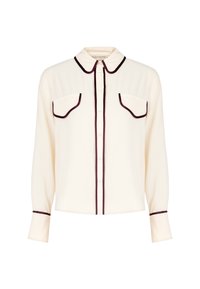 Blusa a maniche lunghe crema con bottoni, con rifiniture scure su colletto, polsini, pattina dei bottoni e tasche a pattina sul petto.