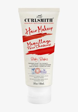 Curlsmith Haar-Make-up in Ruby, eine 90 ml Tube. Es zeichnet sich durch eine cremige Formel mit glattem Textur und einem weißen Hintergrund mit kräftigen roten Akzenten aus.
