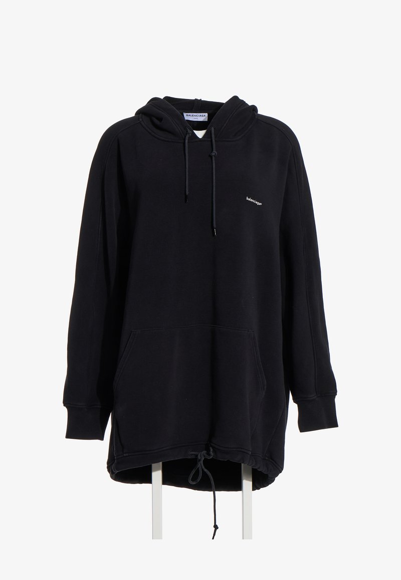 Sweat à capuche noir oversize avec poche avant, cordons sur la capuche et l'ourlet, et petit logo blanc "balenciaga" sur la poitrine gauche.