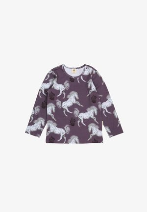 Langärmliges lila Hemd mit einem weißen Pferdemuster, das einen Rundhalsausschnitt und eine weiche Textur aufweist. Schwarze Grasdetails verleihen dem Design eine besondere Note.