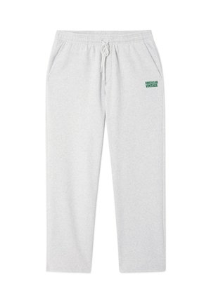 Sive trenirka od mekog materijala, s elastičnim pojasom, vezicom i bočnim džepovima. "American Vintage" logo u zelenoj boji.