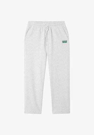 Gaiši pelēkas sporta bikses no mīksta auduma ar elastīgu jostu, auklu un sānu kabatām. Zaļā krāsā "American Vintage" logotips.