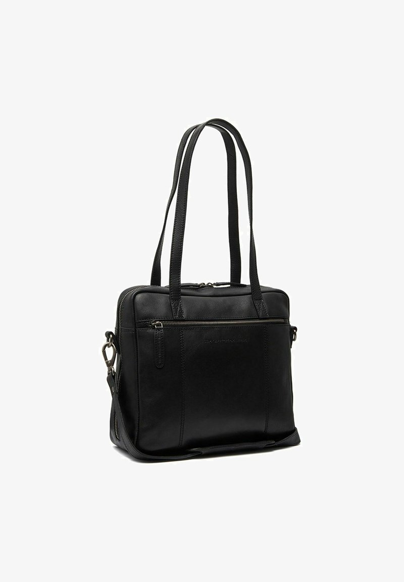 Sac fourre-tout en cuir noir avec double poignées, fermeture zippée et poche extérieure, présentant une texture lisse et un design minimaliste.