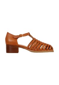 Brown leather sandal with a T-strap design, open toe, and cut-out detailing. Features a low, sturdy block heel and adjustable ankle strap.