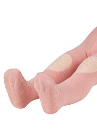 Rosa Strumpfhosen für Kleinkinder mit strukturierten, rutschfesten Griffen an den Sohlen und gemusterten Knieakzenten, gefertigt aus weichem, elastischem Material.