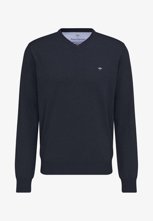 Jūras spēku V veida kakla džemperis, kas izgatavots no kokvilnas. Tam ir ribotu piedurkņu un apakšmalu detaļas, kā arī neliels logo akcents uz krūtīm. Mīksta, gluda tekstūra.