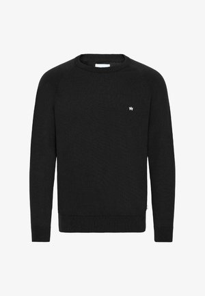 Black sweater made of textured knit fabric, featuring a crew neck and ribbed cuffs, with a small white logo on the chest.