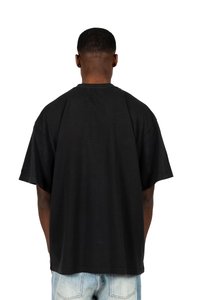 Black cotton t-shirt with short sleeves, loose fit, and a straight hem. The back features a simple, seamless design.