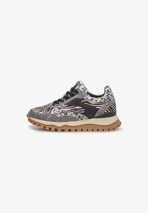 Sneakers featuring a multi-patterned textile upper in grey and black, with a rubber sole and dark accents. Traction grips on the outsole.