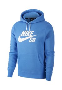 Blå hoodie i mjukt tyg med en framficka, vit Nike SB-logotyp och justerbar huva med dragsko.