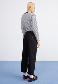 Santa Cruz NOLAN CARPENTER PANT - Džínsy s rovným strihom - black
