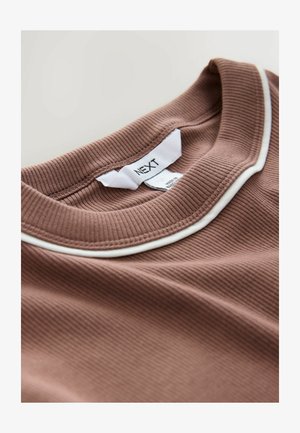 Brown ribbed knit top with a white contrasting collar. Label visible at the neckline, textured fabric, and soft finish.