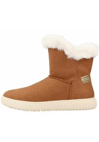 Botín de ante marrón con ribete de piel de oveja blanca en la parte superior, con un diseño cosido y una suela de goma crema. Acabado con una placa de logo metálica.