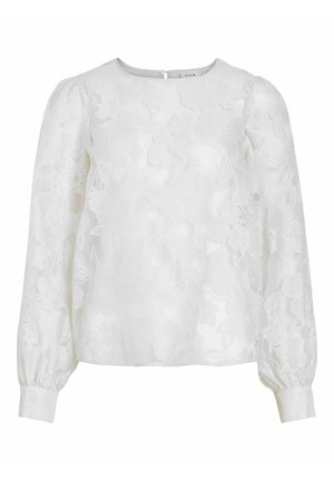 Blouse blanche à manches longues avec motif en dentelle florale, encolure ronde, épaules bouffantes et poignets à boutons.