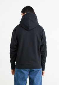 New Balance ALL DAY UNIFORM HOODIE UNISEX - Mikina - black