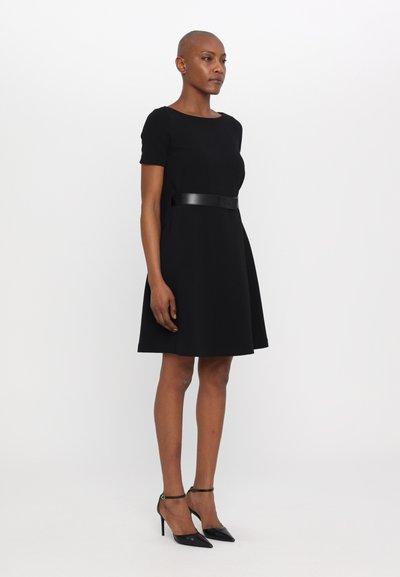 Black short-sleeve dress with a fitted bodice and flared skirt, featuring a black leather belt at the waist and a smooth fabric texture.