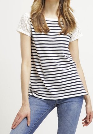 Striped t-shirt in navy and white, featuring short lace sleeves and a relaxed fit. Soft fabric with a classic round neckline.