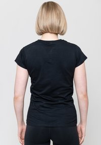 Paradiso Clothing MOTLEY CRUE HEELS SKINNY UNISEX - Print T-shirt - black