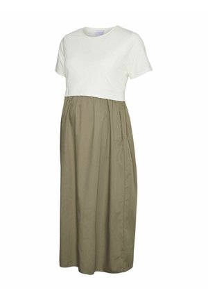 Graviditetskedel med en hvid tætsiddende top og en olivengrøn nederdel. Har en rund halsudskæring og samlet stof ved taljen for komfort.