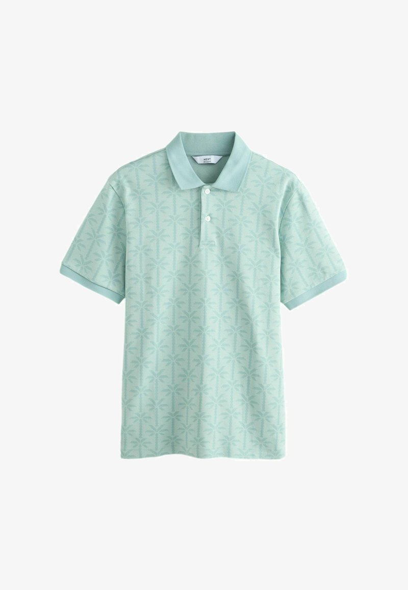 Polo vert clair à manches courtes avec un motif subtil de palmiers et deux boutons sur la patte de boutonnage avant.