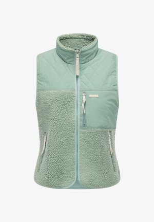 Gilet verde chiaro con sezione superiore trapuntata e sezione inferiore in pile morbido e testurizzato, dotato di tasche con zip e colletto alto.