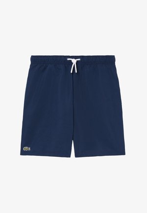 Costume da bagno blu navy con coulisse bianca in vita e piccolo logo coccodrillo verde sulla gamba sinistra in basso.