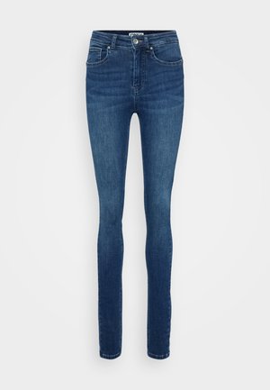 Jeans skinny blu realizzati in denim, con vita alta, cinque tasche e una leggera scoloritura. Presentano una chiusura frontale con bottone e zip.