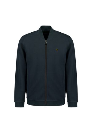 Marineblauwe zip-up jack met een ronde hals, ribgebreide manchetten en een klein logo-accent op de borst. Gemaakt van zachte, gestructureerde stof.