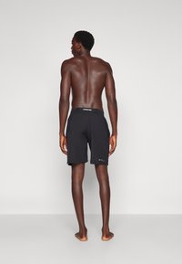 Venum G-FIT AIR TRAINING SHORT - Športne kratke hlače - deep black/desert sand