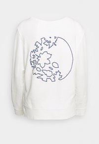 Bílá mikina s grafikou modrého obrysu glóbusu s listy. Kulatý výstřih a žebrované lemy na rukávech a spodním okraji. Měkká texturovaná látka.