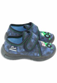 Blaue Stoffschuhe mit grüner Naht, ausgestattet mit einem Klettverschluss. Das Design beinhaltet bunte Tiergrafiken auf den Zehen. Gummisohlen sind sichtbar.