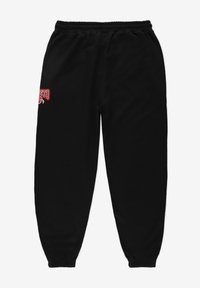 Czarne dresy wykonane z miękkiego materiału, z elastycznym paskiem na sznurki w talii i elastycznymi mankietami. Na lewej biodrze znajduje się czerwony nadruk z logotypem.