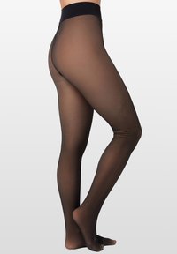 Przezroczyste brązowe rajstopy z czarną elastyczną talią, lekką fakturą i gładkim wykończeniem, zaprojektowane tak, aby przylegać do nogi.