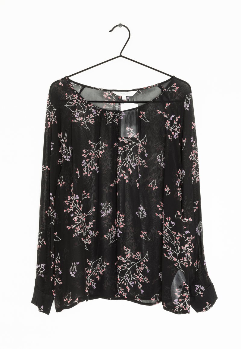 Blusa nera con maniche lunghe, decorata con un motivo floreale in rosa e viola. Realizzata in tessuto leggero e trasparente con una vestibilità comoda.
