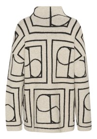 Beige tröja med ett minimalistiskt svart geometriskt mönster. Har en hög krage och lös passform. Mjuk textur och kontrasterande designdetaljer.
