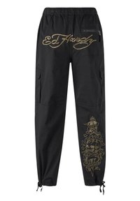 Schwarze Cargo-Hosen mit elastischem Bund, versehen mit goldenem, gesticktem "Ed Hardy"-Logo auf der Rückseite und aufwendigen Grafiken am linken Bein.