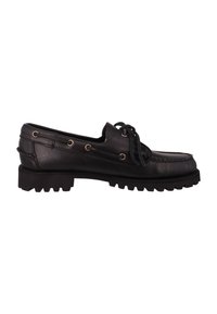 Zapato de barco de cuero negro con punta redonda, costuras en contraste y suela de goma robusta. Presenta ojales de metal y cordones.