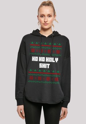 Black hooded sweatshirt with a loose fit, featuring a graphic pattern in green and red, text "HO HO HOLY SHIT" in large white font.