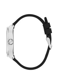 Vue latérale d'une montre-bracelet avec boîtier argenté, couronne ronde, bracelet noir réglable et boucle en métal sur fond blanc.