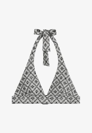 Zwart-wit gestippelde triangle bikini top met strikbandjes, voorzien van bloemmotieven op een contrasterende achtergrond en een gladde textuur.