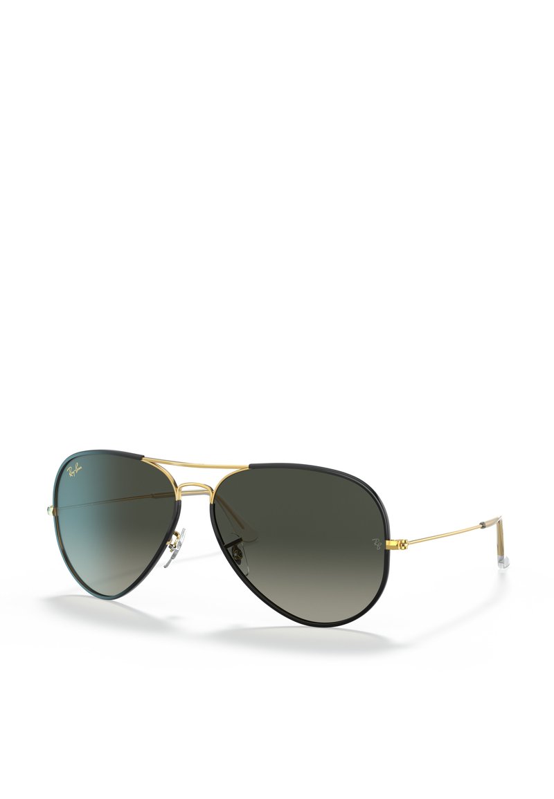 Occhiali da sole aviator con montatura in metallo dorato, dettagli neri e lenti grigie sfumate. Presentano un doppio ponte e naselli trasparenti.