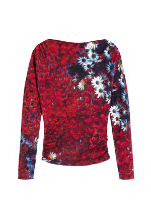 Dlhý rukávový top z jasne červenej látky s kvetinovými a srdcovými vzormi. Hladká textúra s nariasenými detailmi po bokoch.