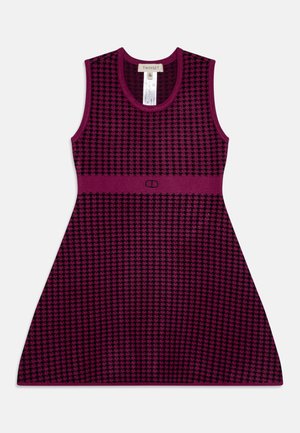 Sleeveless dress in dark magenta with a houndstooth pattern. Soft textured fabric, fitted waist, flared skirt, and logo detail.