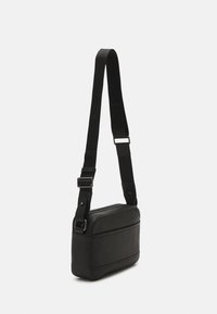 Tommy Hilfiger PREMIUM CAMERA BAG UNISEX - Taška s příčným popruhem - black