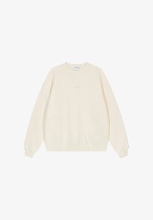 Crewneck sweatshirt in crème, gemaakt van zachte katoen. Heeft lange mouwen, ribgebreide boorden en een subtiele merklogo op de borst.